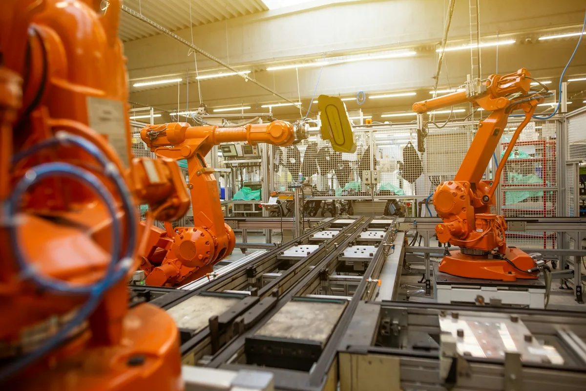 Robotic arms on an automated industrial production line